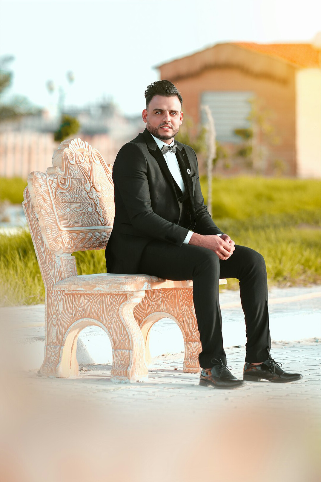 Professional portrait of a man in a suit with a confident smile