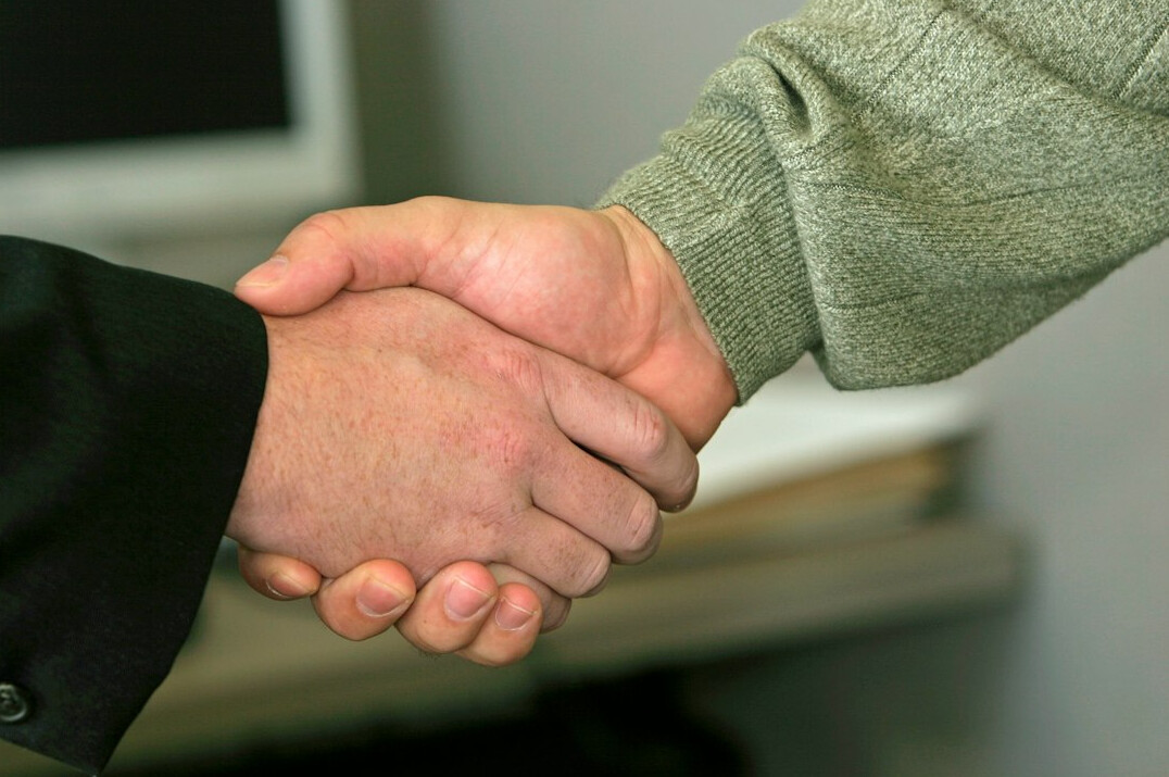 peaceful handshake after talk
