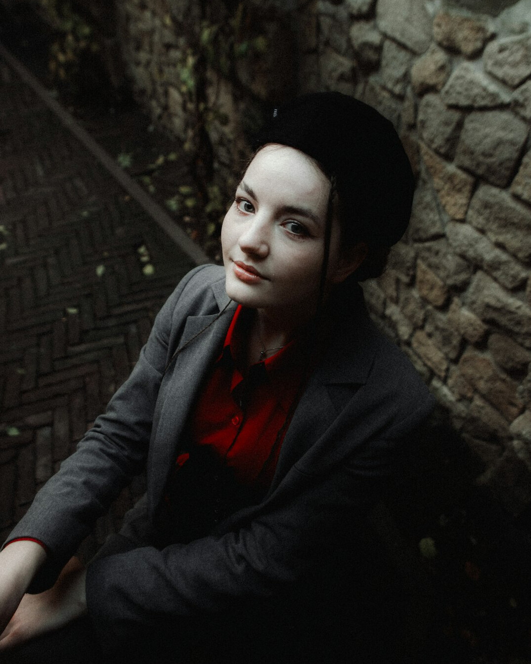 Professional portrait of a woman with dark hair in a blazer